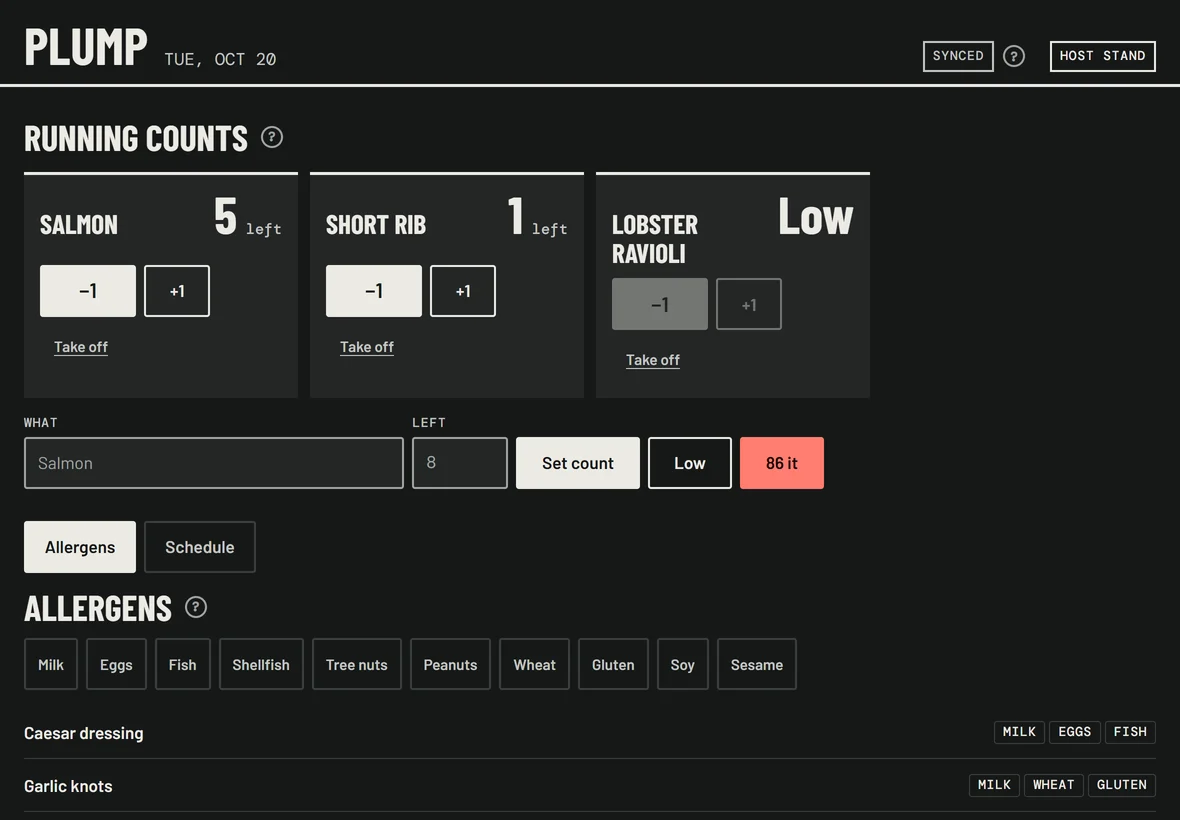 The front screen’s running counts: salmon at 5 left, short rib at 1, lobster ravioli low.